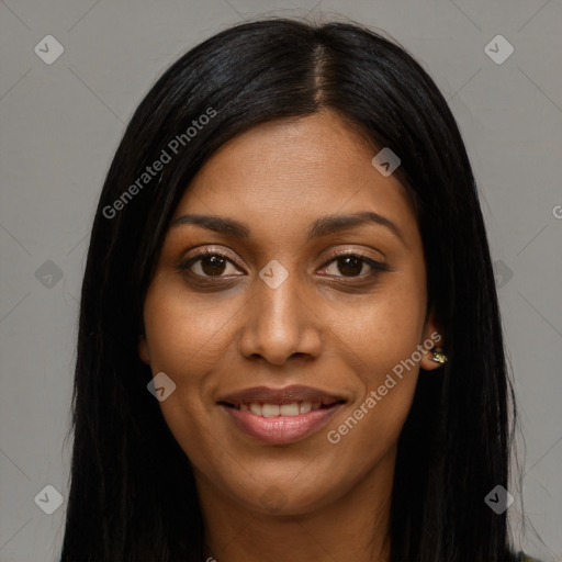 Joyful black young-adult female with long  black hair and brown eyes