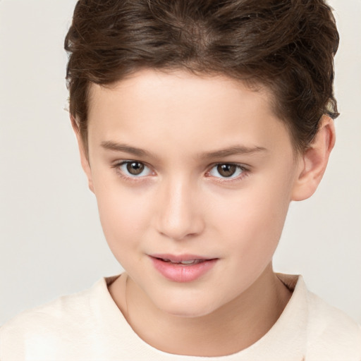 Joyful white child female with short  brown hair and brown eyes