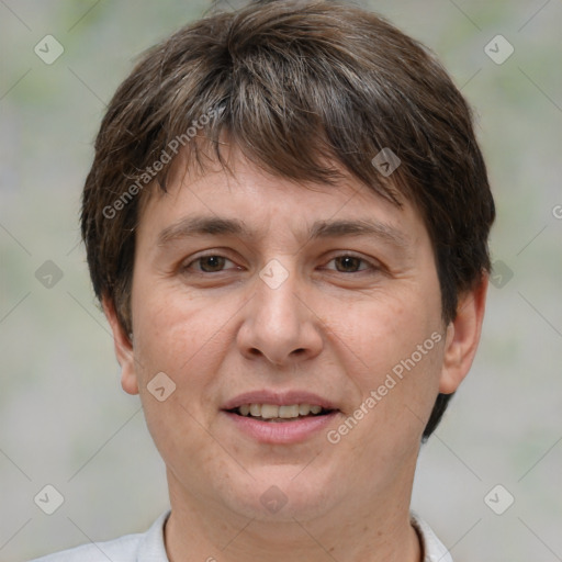 Joyful white adult female with short  brown hair and brown eyes