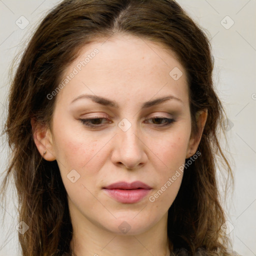 Joyful white young-adult female with long  brown hair and green eyes