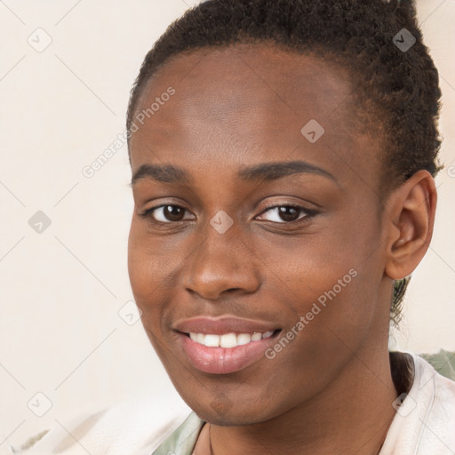 Joyful black young-adult female with short  brown hair and brown eyes