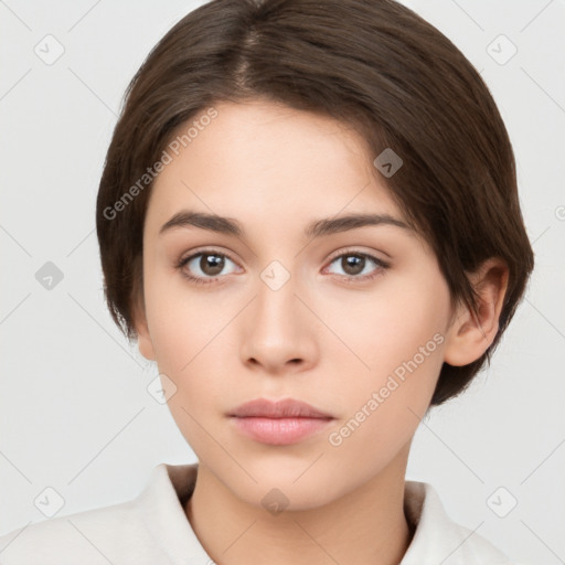 Neutral white young-adult female with medium  brown hair and brown eyes