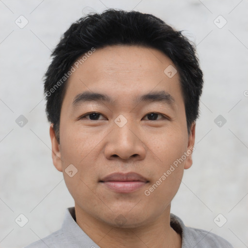 Neutral asian young-adult male with short  black hair and brown eyes