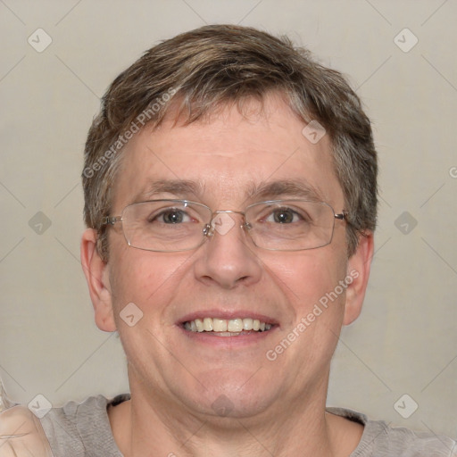 Joyful white adult male with short  brown hair and grey eyes