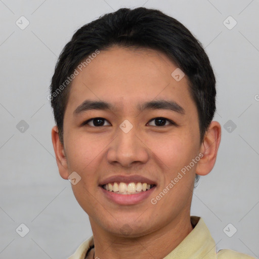 Joyful asian young-adult male with short  black hair and brown eyes