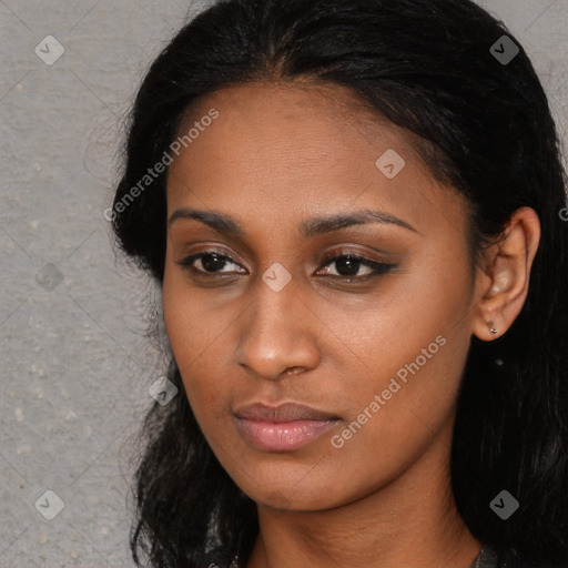 Neutral black young-adult female with long  brown hair and brown eyes