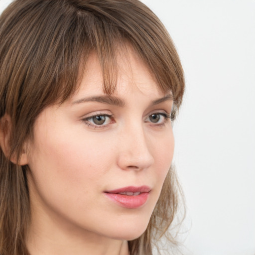 Neutral white young-adult female with long  brown hair and grey eyes