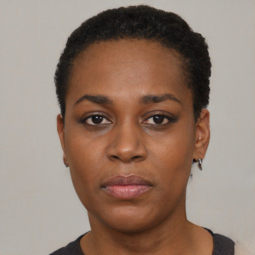 Neutral black young-adult female with short  black hair and brown eyes