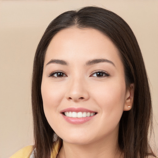 Joyful white young-adult female with long  brown hair and brown eyes