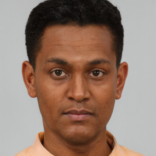 Neutral black young-adult male with short  brown hair and brown eyes