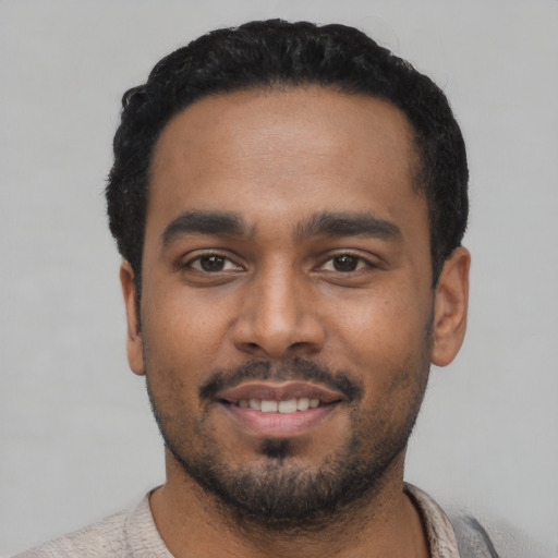 Neutral black young-adult male with short  black hair and brown eyes