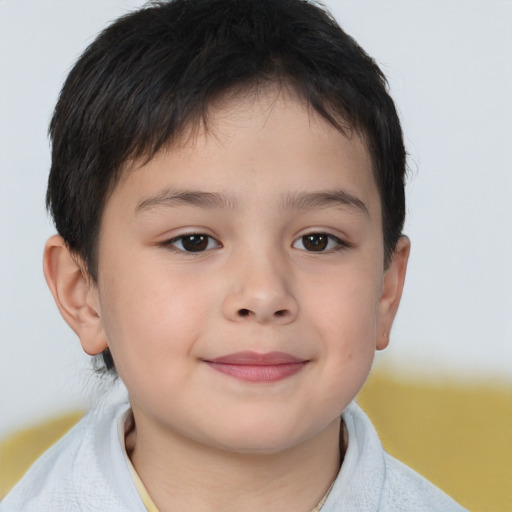 Joyful white child male with short  brown hair and brown eyes