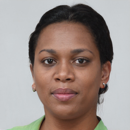 Neutral black young-adult female with short  brown hair and brown eyes