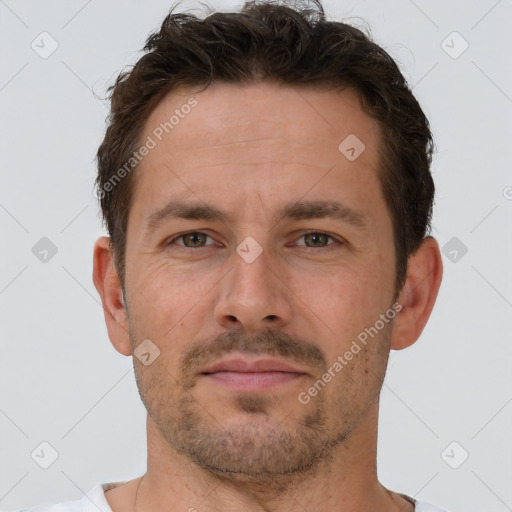 Neutral white adult male with short  brown hair and brown eyes