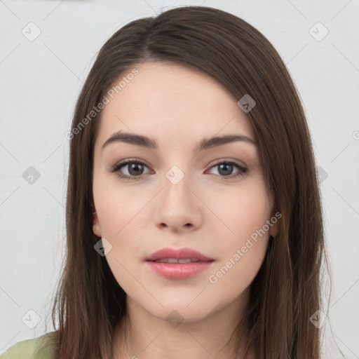 Neutral white young-adult female with long  brown hair and brown eyes