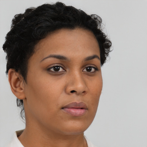 Neutral latino young-adult female with short  brown hair and brown eyes