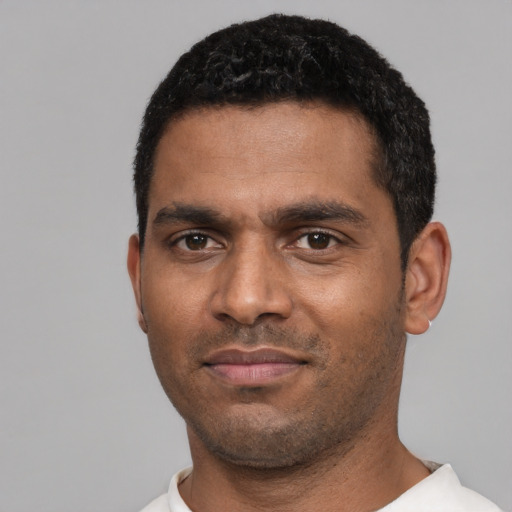 Neutral black young-adult male with short  black hair and brown eyes