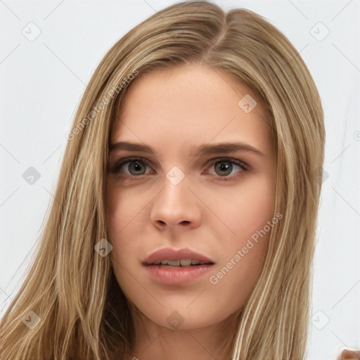 Neutral white young-adult female with long  brown hair and brown eyes