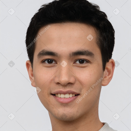 Joyful white young-adult male with short  black hair and brown eyes