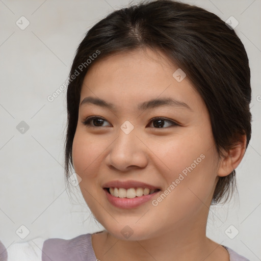 Joyful white young-adult female with medium  brown hair and brown eyes