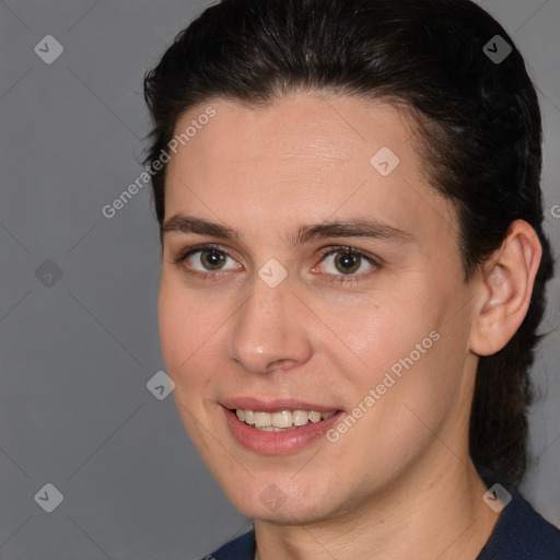 Joyful white young-adult female with medium  brown hair and brown eyes