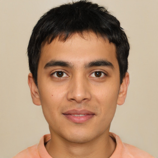 Joyful asian young-adult male with short  brown hair and brown eyes