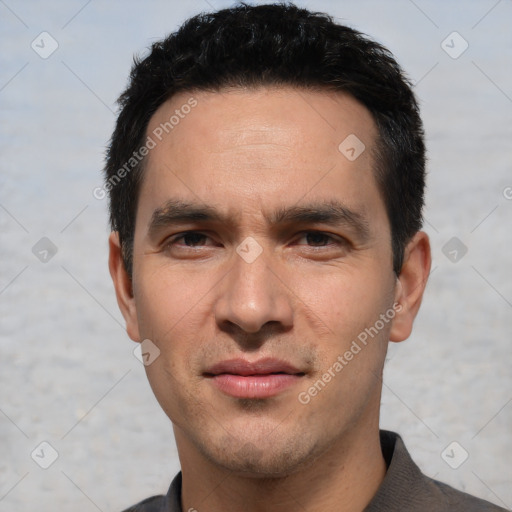 Joyful white young-adult male with short  black hair and brown eyes