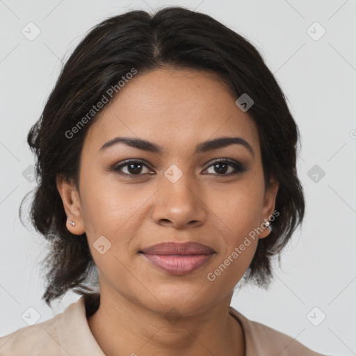 Joyful latino young-adult female with medium  brown hair and brown eyes