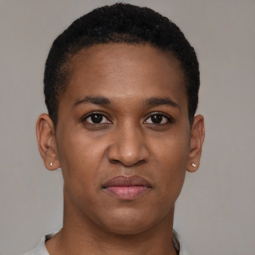 Joyful black young-adult female with short  brown hair and brown eyes