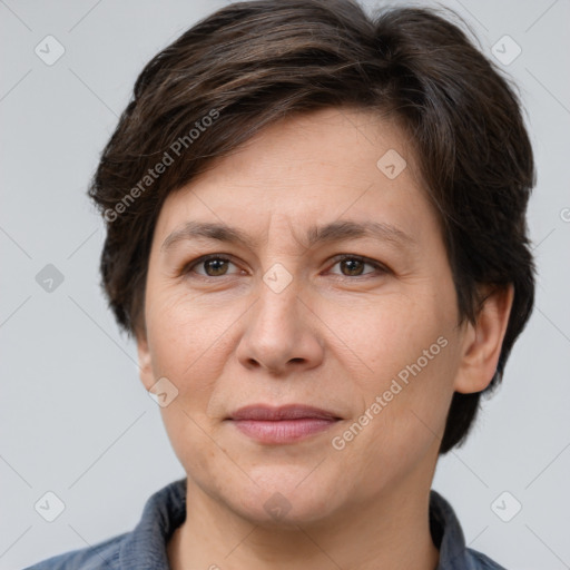 Joyful white adult female with medium  brown hair and brown eyes