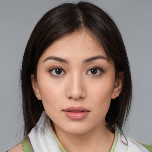 Neutral white young-adult female with medium  brown hair and brown eyes