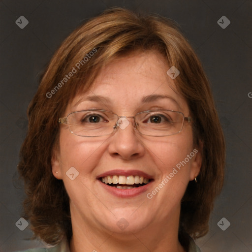 Joyful white adult female with medium  brown hair and green eyes