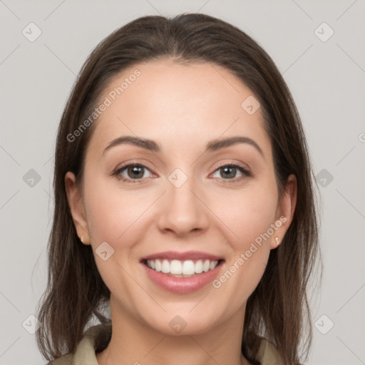 Joyful white young-adult female with medium  brown hair and grey eyes