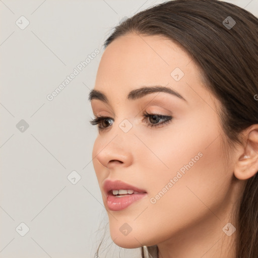 Neutral white young-adult female with long  brown hair and brown eyes