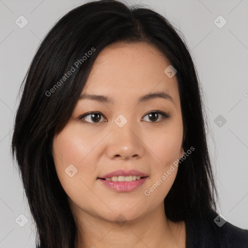 Joyful asian young-adult female with long  brown hair and brown eyes