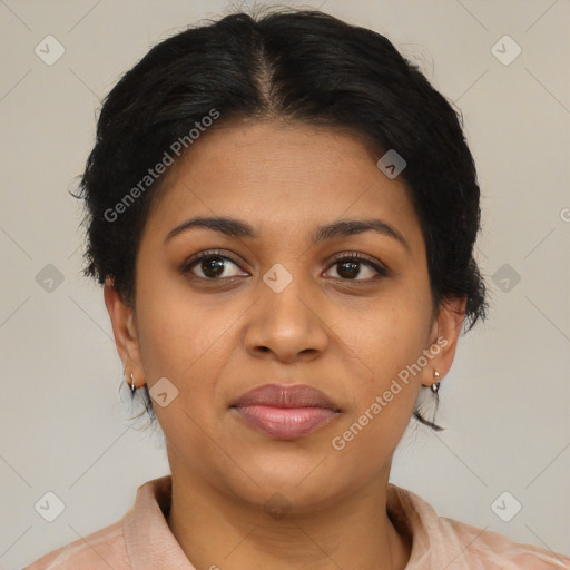 Joyful black young-adult female with short  brown hair and brown eyes