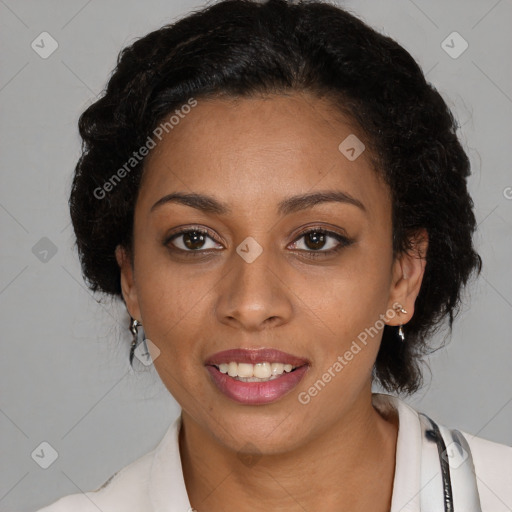 Joyful black young-adult female with medium  brown hair and brown eyes