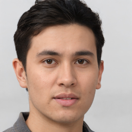 Neutral asian young-adult male with short  brown hair and brown eyes