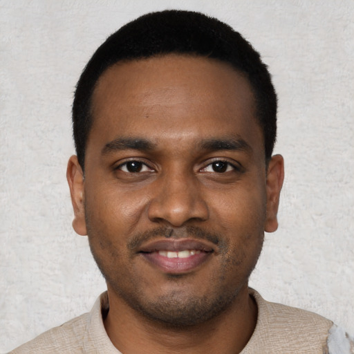 Neutral black young-adult male with short  black hair and brown eyes