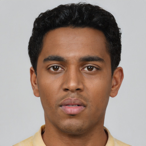 Neutral latino young-adult male with short  black hair and brown eyes