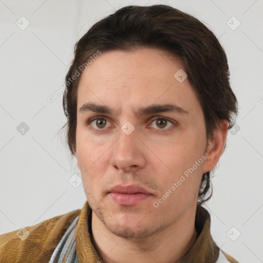 Neutral white adult male with short  brown hair and brown eyes