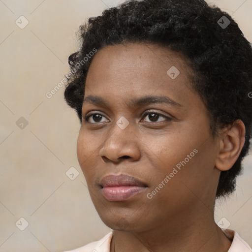 Neutral black young-adult female with short  black hair and brown eyes