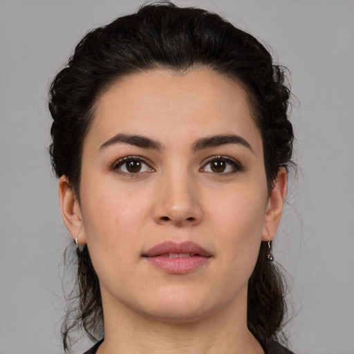 Neutral white young-adult female with medium  brown hair and brown eyes