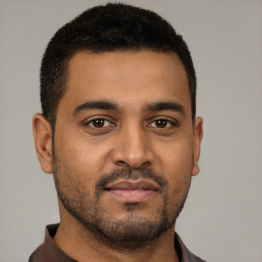Neutral black young-adult male with short  brown hair and brown eyes