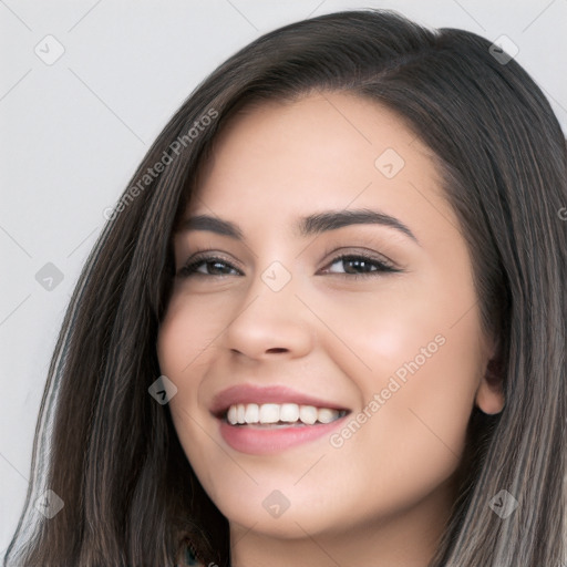 Joyful white young-adult female with long  black hair and brown eyes