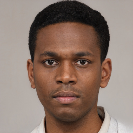 Neutral black young-adult male with short  black hair and brown eyes