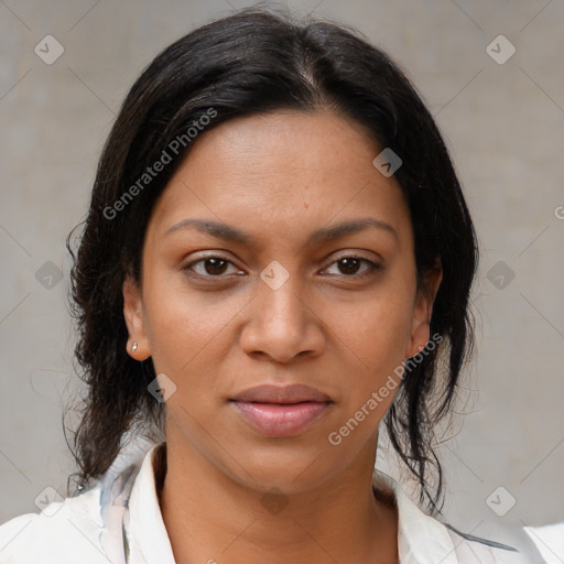 Joyful black young-adult female with medium  brown hair and brown eyes