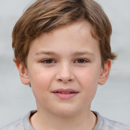 Joyful white child male with short  brown hair and grey eyes