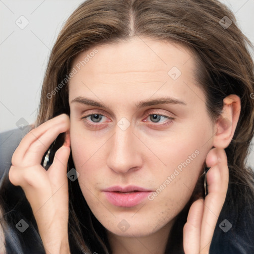 Neutral white young-adult male with long  brown hair and grey eyes