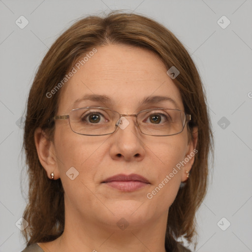 Joyful white adult female with medium  brown hair and grey eyes